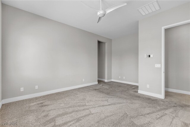 4829 E Beacon Ridge Dr, Pahrump, NV 89061 - carpeted spare room with a ceiling fan and baseboards