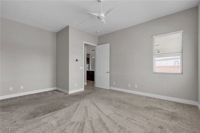 4829 E Beacon Ridge Dr, Pahrump, NV 89061 - carpeted empty room featuring baseboards and a ceiling fan