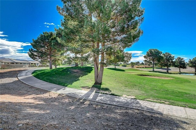 4829 E Beacon Ridge Dr, Pahrump, NV 89061 - view of community with a yard and view of golf course