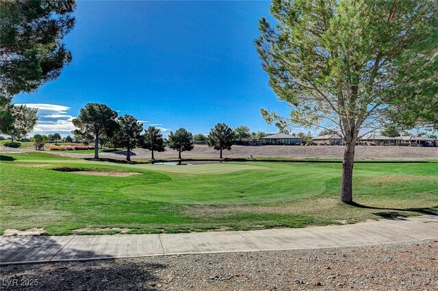 4829 E Beacon Ridge Dr, Pahrump, NV 89061 - surrounding community with golf course view and a yard