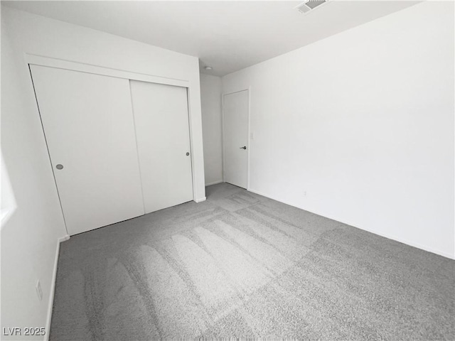 7524 Fencerow St, Las Vegas, NV 89131 - unfurnished bedroom with carpet flooring and a closet