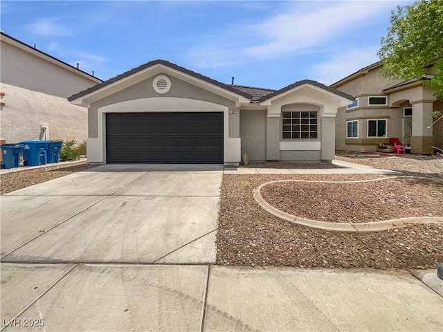 7524 Fencerow St, Las Vegas, NV 89131 - single story home featuring driveway, stucco siding, an attached garage, and a tile roof