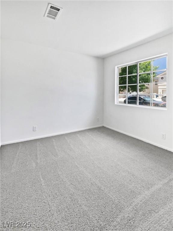 7524 Fencerow St, Las Vegas, NV 89131 - carpeted spare room featuring baseboards