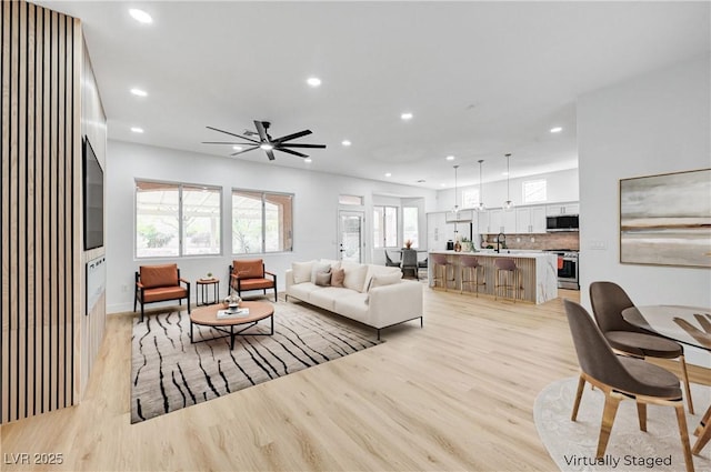 2353 Lauren Dr, Las Vegas, NV 89134 - living area featuring recessed lighting, light wood finished floors, and ceiling fan