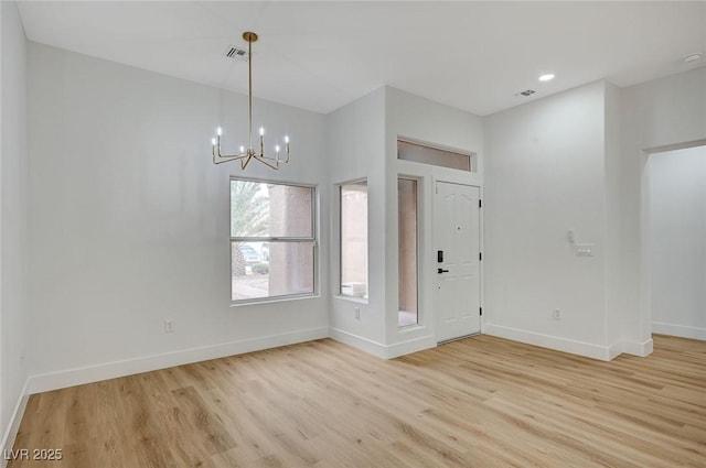 2353 Lauren Dr, Las Vegas, NV 89134 - foyer entrance with light wood finished floors, a chandelier, and recessed lighting