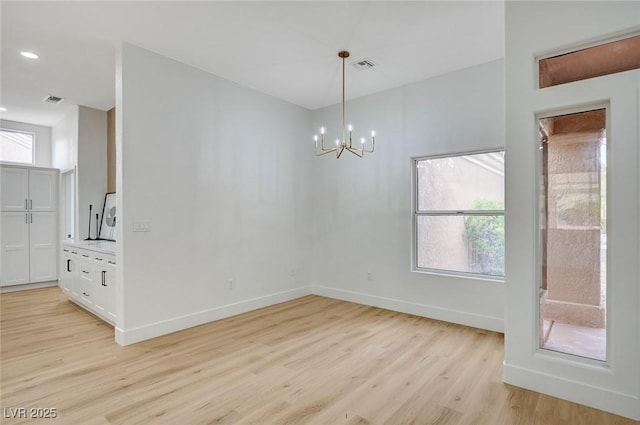 2353 Lauren Dr, Las Vegas, NV 89134 - unfurnished dining area featuring light wood-style floors, a chandelier, and recessed lighting