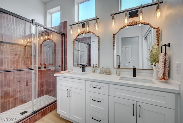 2353 Lauren Dr, Las Vegas, NV 89134 - bathroom featuring a shower stall, double vanity, and a high ceiling