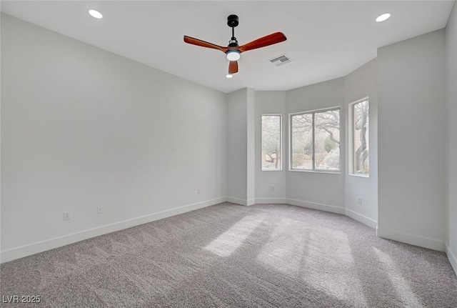 2353 Lauren Dr, Las Vegas, NV 89134 - spare room with a ceiling fan, light carpet, and recessed lighting