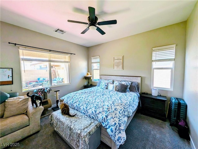 6021 Vivanco St, North Las Vegas, NV 89081 - carpeted bedroom with a ceiling fan