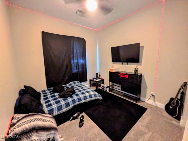 6021 Vivanco St, North Las Vegas, NV 89081 - carpeted bedroom featuring baseboards and ceiling fan