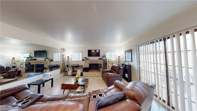 4998 Schumann Dr, Las Vegas, NV 89146 - living area featuring a fireplace and light tile patterned flooring