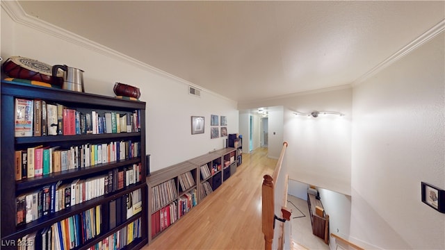 4998 Schumann Dr, Las Vegas, NV 89146 - corridor with an upstairs landing, ornamental molding, and wood finished floors