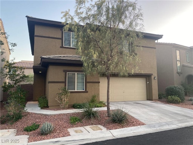 10537 Thor Mountain Ln, Las Vegas, NV 89166 - view of front facade featuring stucco siding, an attached garage, driveway, and a tile roof