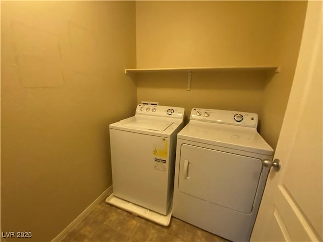 10537 Thor Mountain Ln, Las Vegas, NV 89166 - washroom with washing machine and dryer and baseboards