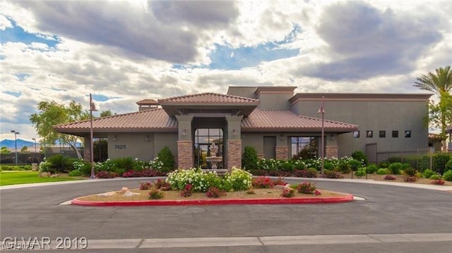 7332 Redhead Dr, North Las Vegas, NV 89084 - view of building exterior featuring uncovered parking