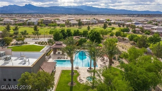 7332 Redhead Dr, North Las Vegas, NV 89084 - aerial view of residential area with mountains