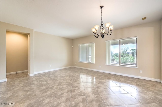 7332 Redhead Dr, North Las Vegas, NV 89084 - empty room featuring a chandelier, light tile patterned floors, and a smoke detector