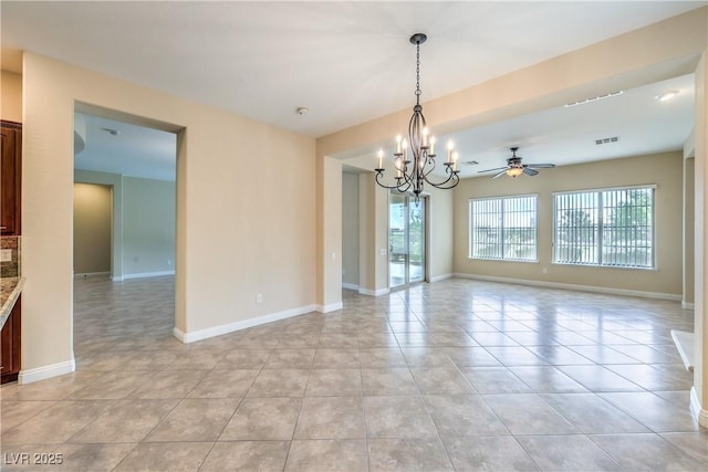 7332 Redhead Dr, North Las Vegas, NV 89084 - empty room featuring a chandelier, light tile patterned floors, and ceiling fan