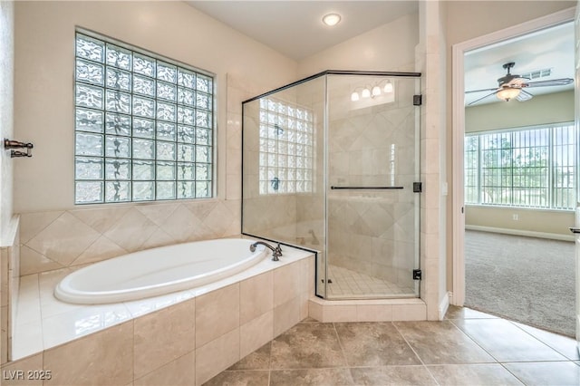7332 Redhead Dr, North Las Vegas, NV 89084 - full bath featuring a bath, a ceiling fan, a shower stall, and tile patterned flooring