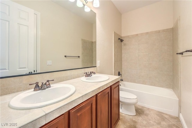 7332 Redhead Dr, North Las Vegas, NV 89084 - bathroom featuring double vanity, tub / shower combination, and tile patterned flooring