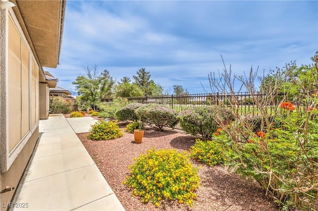7332 Redhead Dr, North Las Vegas, NV 89084 - fenced backyard with a patio area