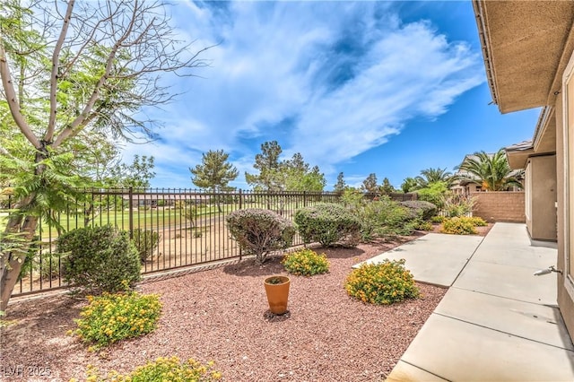7332 Redhead Dr, North Las Vegas, NV 89084 - fenced backyard featuring a patio