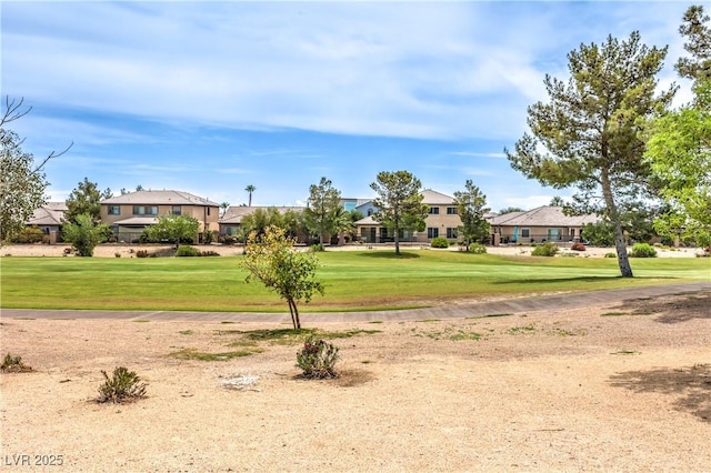 7332 Redhead Dr, North Las Vegas, NV 89084 - view of property's community with a residential view and a yard