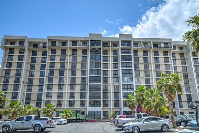 3930 University Center Dr Unit 706, Las Vegas, NV 89119 - view of apartment building / complex featuring uncovered parking