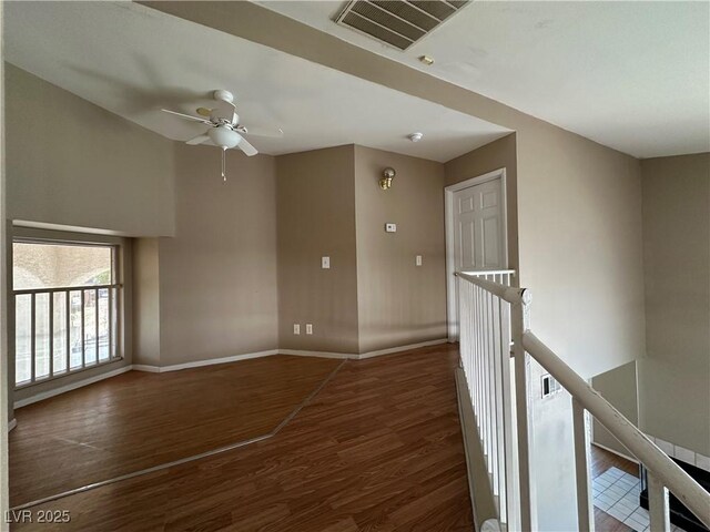 5128 Sandstone Dr, Las Vegas, NV 89142 - empty room with wood finished floors, baseboards, and ceiling fan