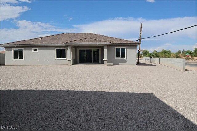 197 E Shelbourne Ave, Las Vegas, NV 89123 - rear view of property with stucco siding and a patio area