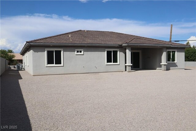 197 E Shelbourne Ave, Las Vegas, NV 89123 - rear view of property with cooling unit and stucco siding