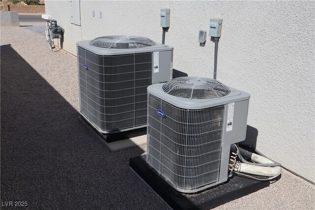 197 E Shelbourne Ave, Las Vegas, NV 89123 - exterior view of central AC, gas meter, and stucco siding