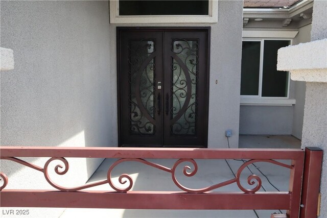 197 E Shelbourne Ave, Las Vegas, NV 89123 - entrance to property featuring french doors and stucco siding