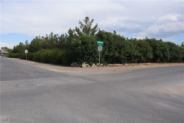 197 E Shelbourne Ave, Las Vegas, NV 89123 - view of asphalt street featuring traffic signs