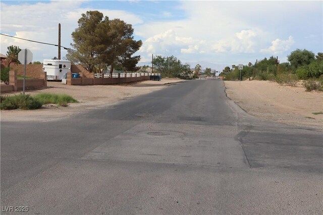 197 E Shelbourne Ave, Las Vegas, NV 89123 - view of asphalt street featuring traffic signs