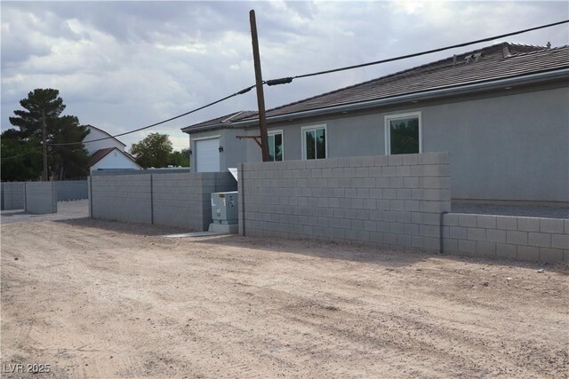197 E Shelbourne Ave, Las Vegas, NV 89123 - view of property exterior with stucco siding