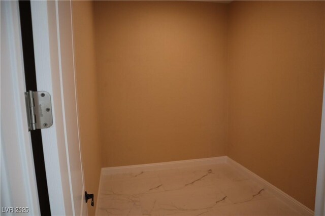 197 E Shelbourne Ave, Las Vegas, NV 89123 - washroom featuring baseboards and marble finish flooring