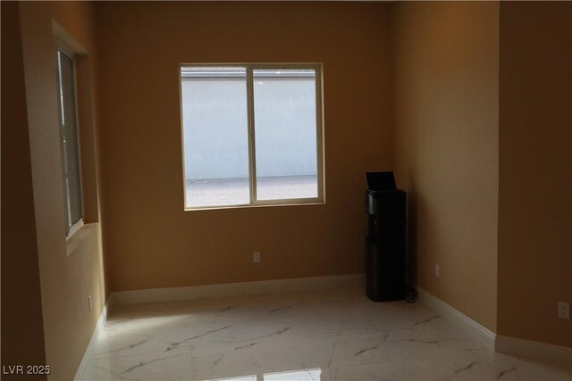197 E Shelbourne Ave, Las Vegas, NV 89123 - empty room featuring marble finish flooring and baseboards