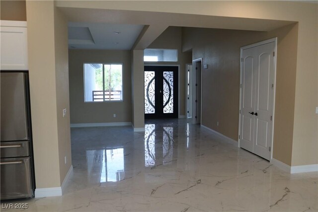 197 E Shelbourne Ave, Las Vegas, NV 89123 - entrance foyer featuring marble tiled flooring and baseboards