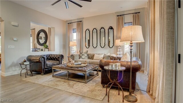 1869 Bronze Patina St, Henderson, NV 89044 - living room featuring ceiling fan, wood finished floors, and baseboards