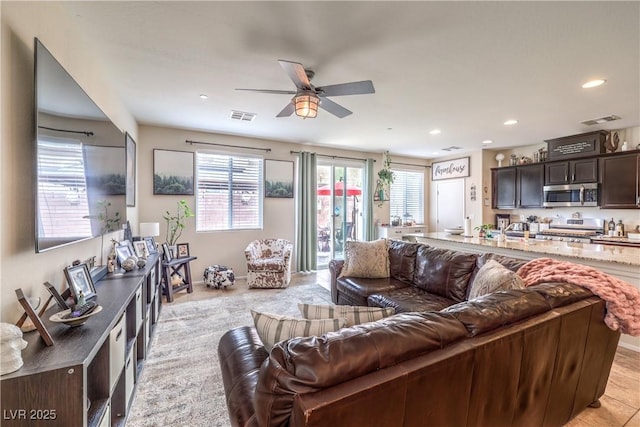 4212 Juanita May Ave, North Las Vegas, NV 89032 - living area with plenty of natural light, ceiling fan, and recessed lighting