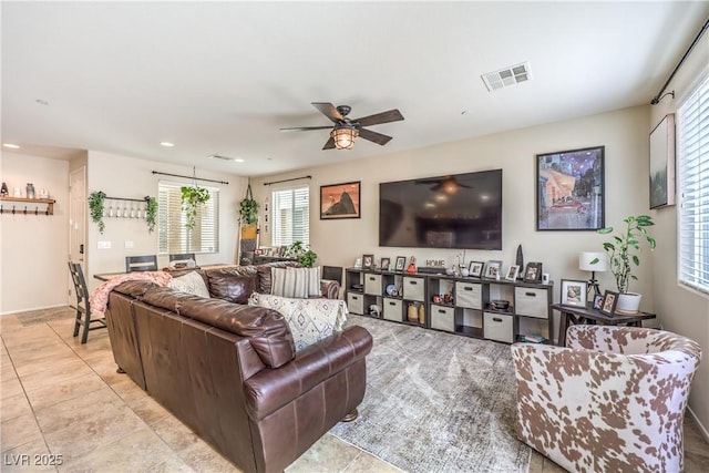 4212 Juanita May Ave, North Las Vegas, NV 89032 - living room with ceiling fan, recessed lighting, light tile patterned floors, and baseboards