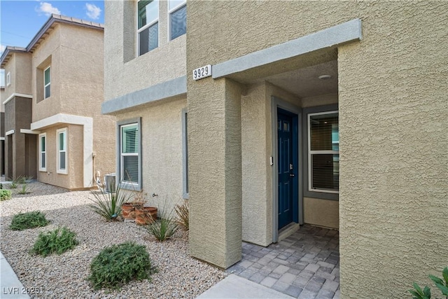 9929 Bumblebee Hills St, Las Vegas, NV 89141 - doorway to property with stucco siding