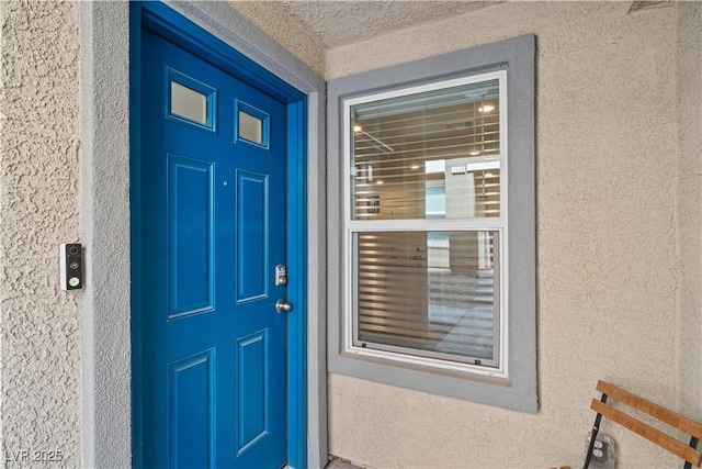 9929 Bumblebee Hills St, Las Vegas, NV 89141 - view of exterior entry featuring stucco siding
