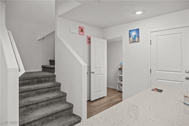9929 Bumblebee Hills St, Las Vegas, NV 89141 - stairway featuring wood finished floors