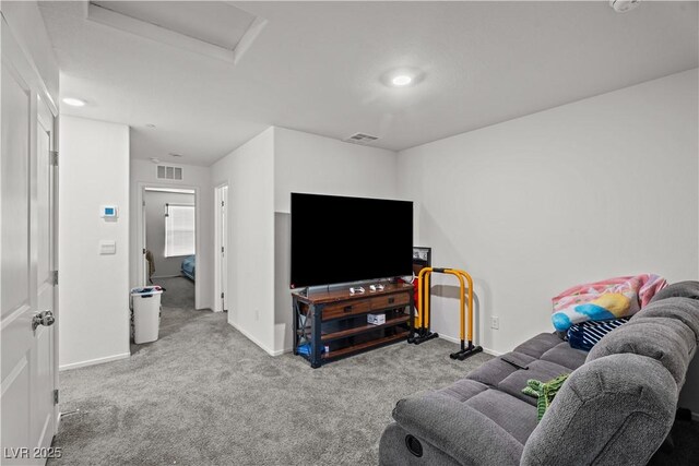 9929 Bumblebee Hills St, Las Vegas, NV 89141 - living area with attic access, carpet floors, and baseboards