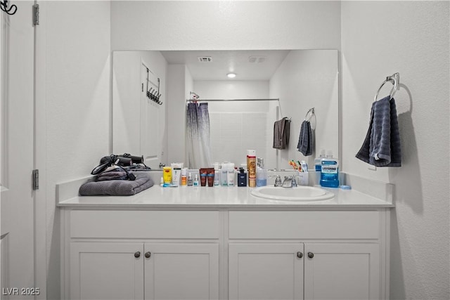 9929 Bumblebee Hills St, Las Vegas, NV 89141 - bathroom featuring vanity and a shower with shower curtain