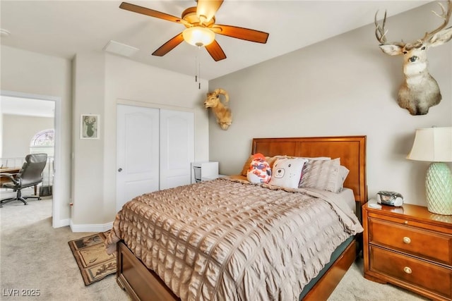 10420 Loma Portal Ave, Las Vegas, NV 89166 - carpeted bedroom featuring a closet, an office area, a ceiling fan, and baseboards