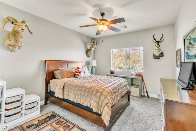10420 Loma Portal Ave, Las Vegas, NV 89166 - bedroom featuring light carpet, baseboards, and a ceiling fan