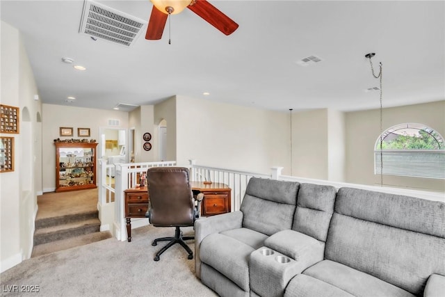 10420 Loma Portal Ave, Las Vegas, NV 89166 - home office featuring light colored carpet, a ceiling fan, arched walkways, recessed lighting, and baseboards
